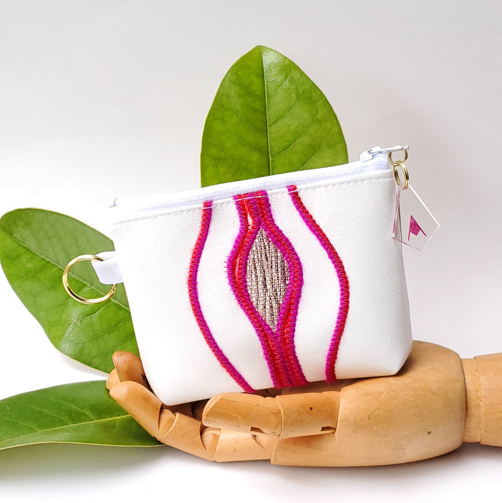 Sacred Fruit Pink and gold Embroidered Vagina Vulva Wallet by Anne Marie Beard. Handmade in Austin, Texas since 2002 y'all! annemarie mini wallet austin texas