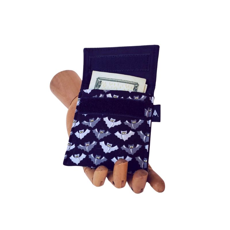 Flying bats on black background Velcro Mini Wallet by Anne Marie Beard. Handmade in Austin, Texas since 2004 y'all! annemarie mini wallet austin texas bats bat colony Mexican Free-tailed bats