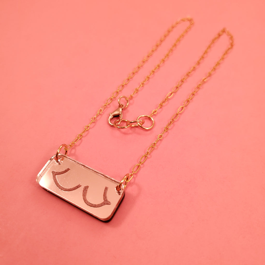 Boobie Bar necklace the Torpedo Titties in pink - full view