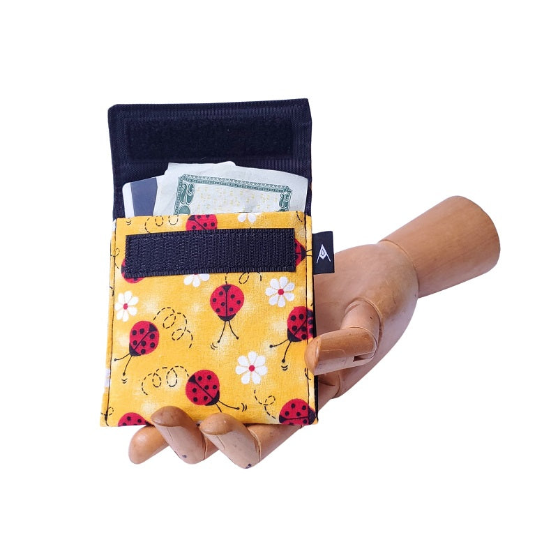 Ladybug red and yellow Print Velcro Mini Wallet by Anne Marie Beard. Handmade in Austin, Texas since 2004 y'all! annemarie mini wallet austin texas