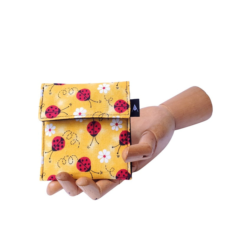 Ladybug red and yellow Print Velcro Mini Wallet by Anne Marie Beard. Handmade in Austin, Texas since 2004 y'all! annemarie mini wallet austin texas