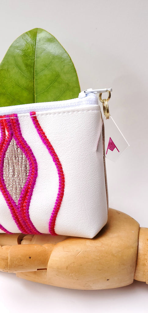 Sacred Fruit Pink and gold Embroidered Vagina Vulva Wallet by Anne Marie Beard. Handmade in Austin, Texas since 2002 y'all! annemarie mini wallet austin texas