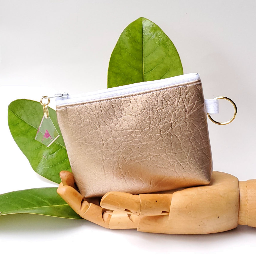 Sacred Fruit Pink and gold Embroidered Vagina Vulva Wallet by Anne Marie Beard. Handmade in Austin, Texas since 2002 y'all! annemarie mini wallet austin texas