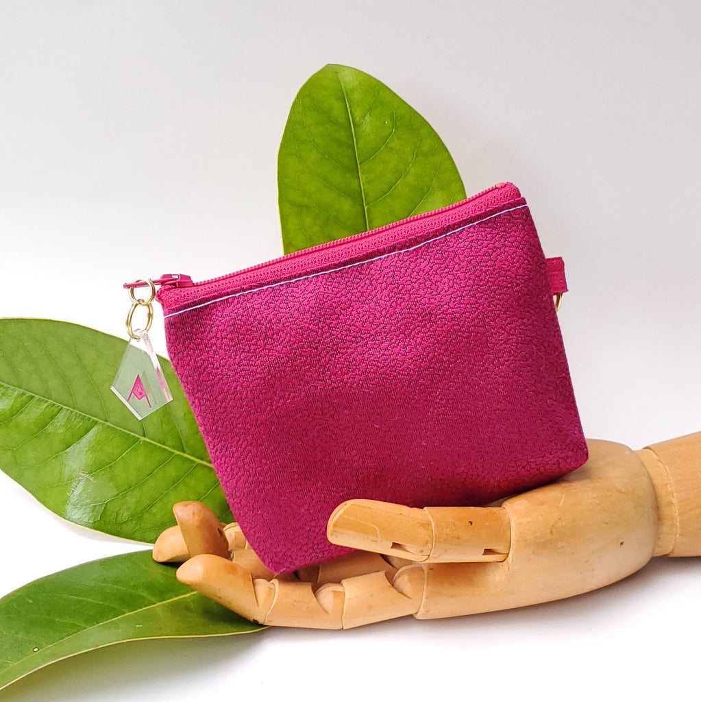 Sacred Fruit Pink embroidery on white Vagina Vulva Wallet by Anne Marie Beard. Handmade in Austin, Texas since 2002 y'all! annemarie mini wallet austin texas