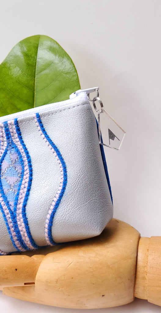 Sacred Fruit Silver with Blue Embroidered Vagina Vulva Wallet by Anne Marie Beard. Handmade in Austin, Texas since 2002 y'all! annemarie mini wallet austin texas
