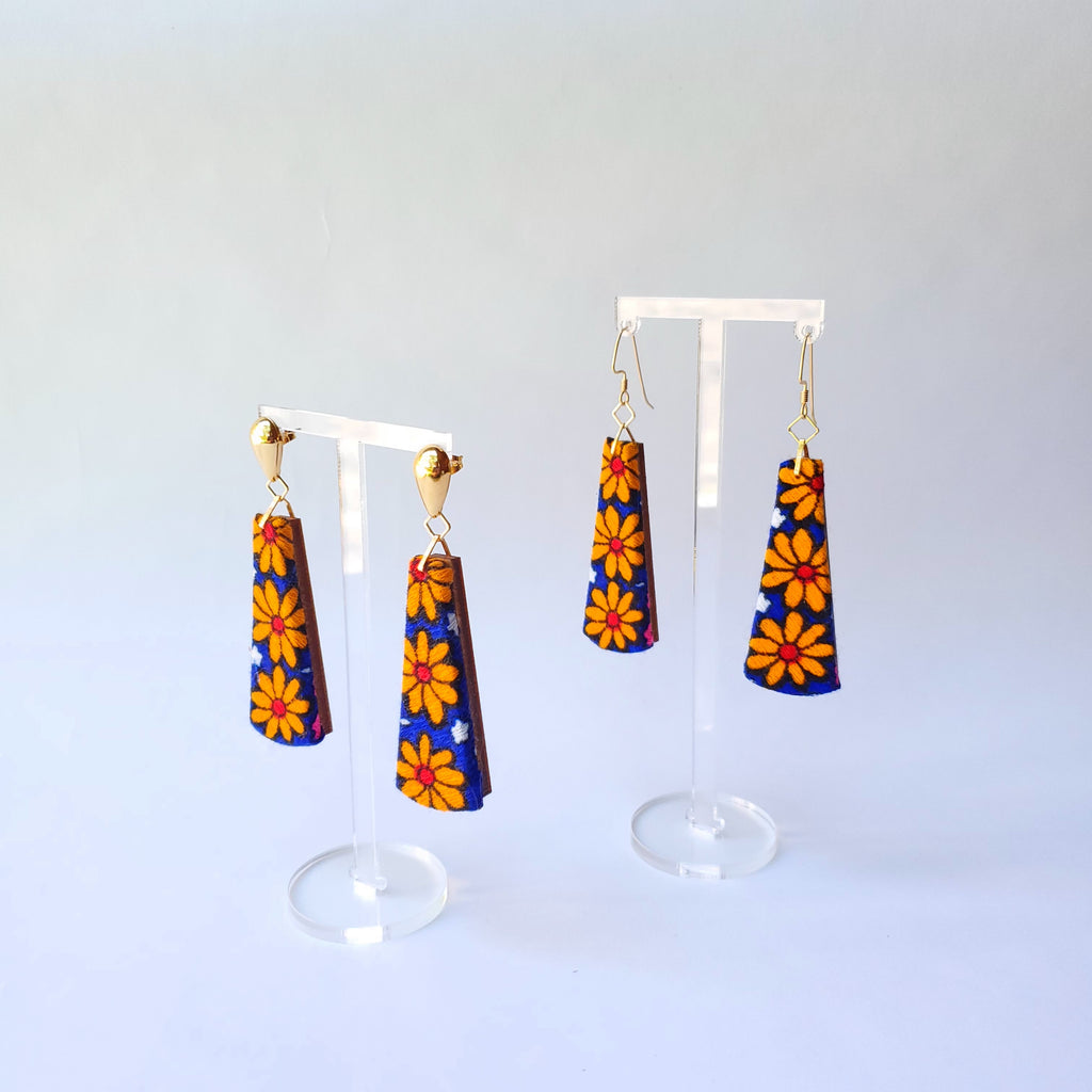 1970s orange & blue flower power Sustainable Textile Earrings made from vintage fabric. Sustainable handmade by jewelry designer Anne Marie Beard in Austin, Texas.