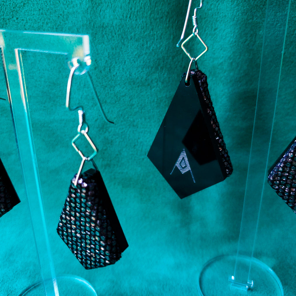 Black Shimmer Sustainable Textile Earrings made from fashion waste. Sustainable handmade by jewelry designer Anne Marie Beard in Austin, Texas.