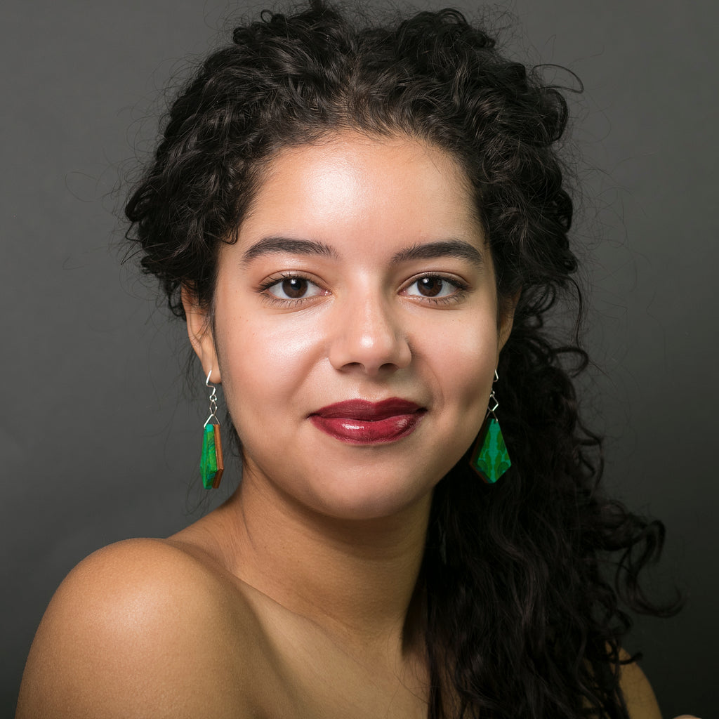 Emerald Green Silk fabric sustainable textile earrings. Handmade by designer Anne Marie Beard in Austin, Texas. Model Melina Perez Photographer Rachel Boettcher